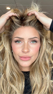 Model is wearing CALIFORNIA BEACH WAVES by TRESSALLURE in 14/26/R10 | Red Blonde with Gold Blonde highlights and Light Brown roots