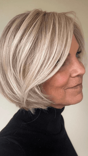 Susan Sparks @sparkles_intheworld wearing STRAIGHT UP WITH A TWIST by RAQUEL WELCH WIGS in color RL19/23SS SHADED BISCUIT | Cool Platinum blonde with subtle highlights and medium brown roots