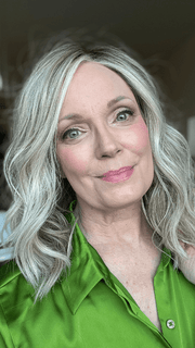 Mel B. @mels.be.ageless wearing WAVY DAY by RAQUEL WELCH WIGS in color RL17/23SS ICED LATTE MACCHIATO | Honey Blonde shaded with Cool Blonde and Dark Roots