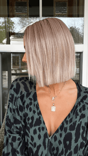 Jenna Fail @jenna_fail wearing LIA II by ELLEN WILLE in color CANDY BLONDE ROOTED 101.27.60 | Pearl Platinum, Dark Strawberry Blonde, and Pearl White Blend with Dark Shaded Roots