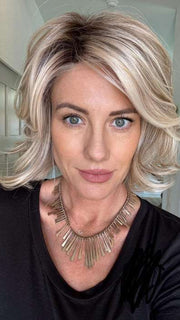 Jenny @thewiggygirl wearing CROWD PLEASER by RAQUEL WELCH in color RL19/23SS SHADED BISCUIT | Light Ash Blonde Evenly Blended with Cool Platinum Blonde and Dark Roots