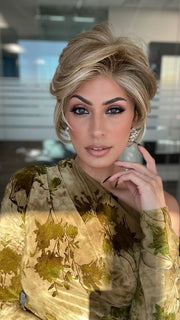 ROXIE wearing CAPTIVATING CANVAS by RAQUEL WELCH in RL13/88 Golden Pecan | Neutral Medium Blonde With Pale Honey Blonde Highlights