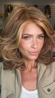 Madeline wearing GODDESS by RAQUEL WELCH in RL29/25 | GOLDEN RUSSET | Ginger Blonde Evenly Blended with Medium Golden Blonde