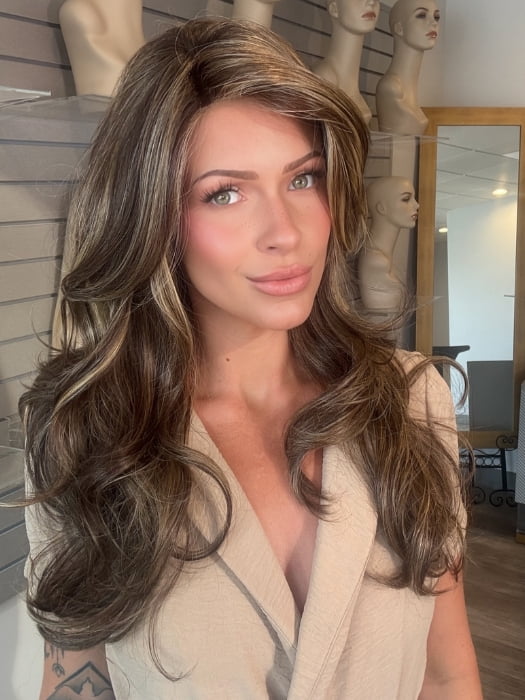 Madeline wearing LILLY by TRESSALLURE in CHOCOLATE BUTTERCREAM R | Medium and Dark Brown Rooted with a Blend of Medium Brown and Dark Blonde