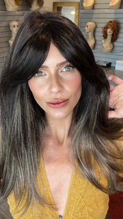 Madeline wearing CAMILLA by JON RENAU in Camilla by JON RENAU in S2-103/18RO MIDNIGHT | Cascading Ombre Shade | Long Dark Roots blend into Lighter Brown Tones and Sparkling Ash Blond Tips