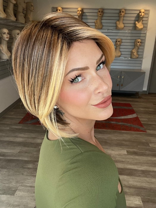 Madeline is wearing POISED by TRESSALLURE in EL17/23/R8 | Pale Auburn Beige Blonde Blend, Rooted Medium Brown, Highlighted Light Blonde with face framimg highlights