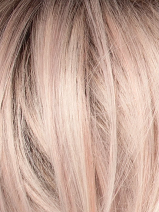POLARIZING PINK | Icy platinum blonde blended with soft rose and silver undertones. Medium ash brown roots add dimension and depth.