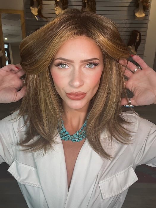 Madeline wearing PIANA by BELLETRESS in BUTTER PECAN R | A blonde/red blend with a golden-beige base swirled with soft, buttery highlights and light caramel pecan lowlights.
