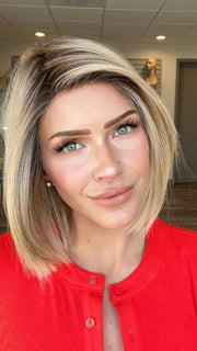 Madeline is wearing SANTA MONICA by BELLETRESS in RAW SUGAR BLONDE | A Neutral Light Blonde, Honey Blonde, Pale Gold Blonde, with a base of Light Brown Low Lights featuring a Medium Root Color