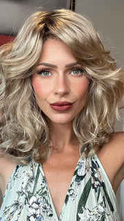 Madeline wearing FINN by ESTETICA in RH1488RT8 | Dark Blonde with Light Copper Blonde Highlights & Golden Brown Roots