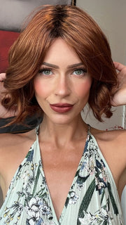 Madeline wearing TARA by RENE OF PARIS in  SHADED-AMBER | Coppery Blonde and Red Blend with Dark Amber Brown Roots