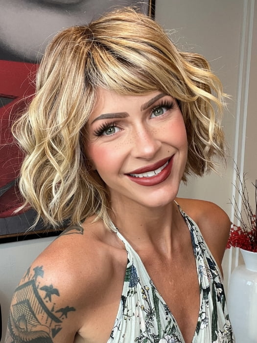 Madeline wearing TREND by TRESSALLURE in 14/26/R10 | Red Blonde with Gold Blonde Highlights and Light Brown Roots