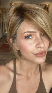 Madeline is wearing IGNITE PETITE by JON RENAU in FS26/31S6 SALTED CARAMEL | Medium Natural Red Brown with Red Gold Blonde Bold Highlights, Shaded with Brown