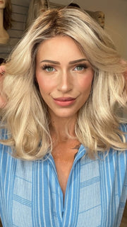 Madeline wearing AMANDA by ENVY in PLATINUM SHADOW | Light Blonde with Dark Roots