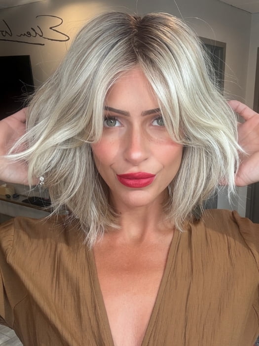 Madeline wearing EMILIA by BELLETRESS in BUTTERBEER R | Dark Brown Base and Root that transitions smoothly into a buttery blonde, infused with creamy honey and toffee tones