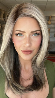 Madeline is wearing CHARMING by TRESSALLURE in 52/38/49/R8 | 3 Tones of Grey blended with Dark Brown Roots