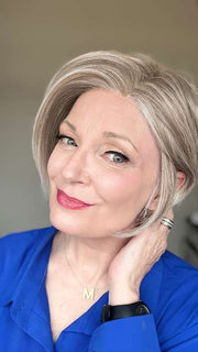 Mel B. @mels.be.ageless wearing IGNITE LARGE by JON RENAU in color 56F51 OYSTER | Light Grey with 20% Medium Brown Front, graduating to Grey with 30% Medium Brown Nape