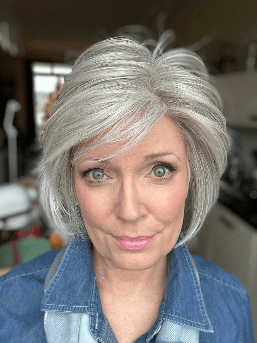 Mel B. @mels.be.ageless wearing FLIRTING WITH FASHION by RAQUEL WELCH WIGS in color RL56/60 SILVER | Lightest Gray Evenly Blended with Pure White