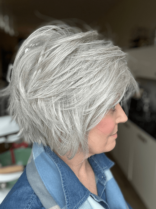 Mel B. @mels.be.ageless wearing FLIRTING WITH FASHION by RAQUEL WELCH WIGS in color RL56/60 SILVER | Lightest Gray Evenly Blended with Pure White