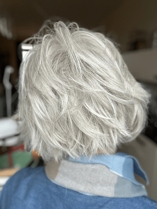 Mel B. @mels.be.ageless wearing FLIRTING WITH FASHION by RAQUEL WELCH WIGS in color RL56/60 SILVER | Lightest Gray Evenly Blended with Pure White