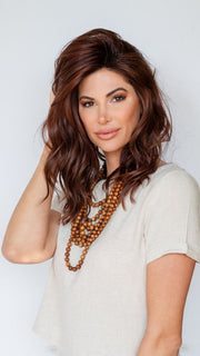 Katy C. @thewigeducator wearing BEACH WAVE MAGIC by TRESSALLURE in color 10/130R | Bright Red with Medium Brown roots