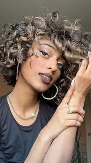 JORDAN by ENVY BY ALAN EATON in color AMARETTO-CREAM | Dark Brown roots with overall Medium Brown base with Honey Blonde highlights