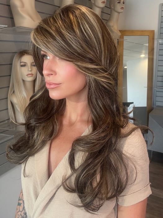 Madeline wearing LILLY by TRESSALLURE in CHOCOLATE BUTTERCREAM R | Medium and Dark Brown Rooted with a Blend of Medium Brown and Dark Blonde