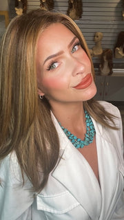 Madeline wearing PIANA by BELLETRESS in BUTTER PECAN R | A blonde/red blend with a golden-beige base swirled with soft, buttery highlights and light caramel pecan lowlights.