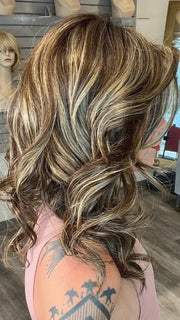 Madeline wearing ELLE by BELLETRESS in CAPPUCINO LATTE R | A Deep brunette with light brown highlights and lowlights