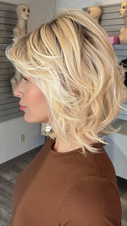 Madeline wearing NEW WAVE by TRESSALLURE in 24/102/R12 | Gold Blonde with Platinum highlights with Gold Brown roots