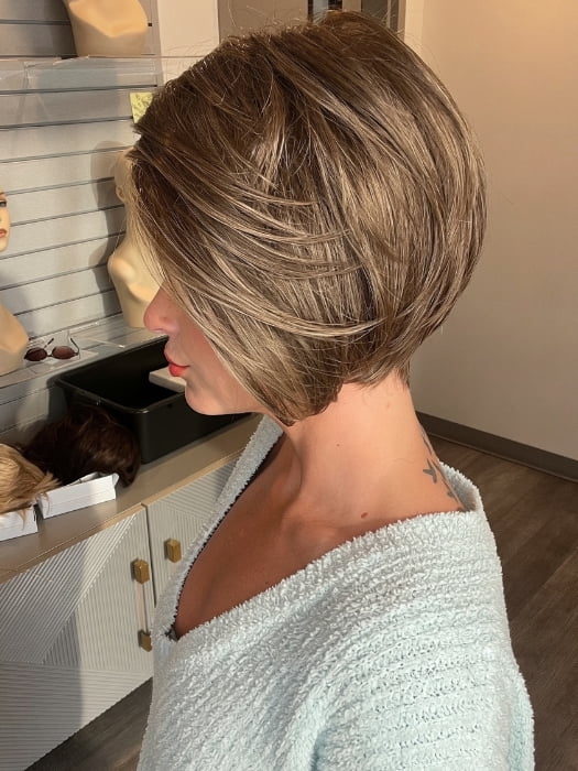 Madeline wearing IGNITE PETITE by JON RENAU in 8RH14 HOT COCOA | Medium Brown with 33% Medium Natural Blonde Highlights