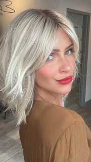 Madeline wearing EMILIA by BELLETRESS in BUTTERBEER R | Dark Brown Base and Root that transitions smoothly into a buttery blonde, infused with creamy honey and toffee tones