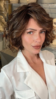 Madeline wearing HOUSTON by BELLETRESS in FRENCH ROAST BROWN-R  | A deep, luxurious brunette featuring a dark brown base with warm bronze and subtle red undertones. Softly rooted for natural depth and dimension.
