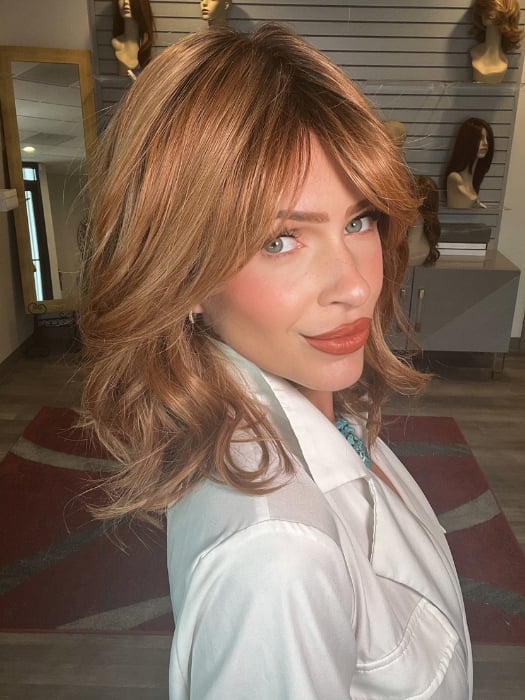 Madeline wearing HEPBURN by BELLETRESS in MIXED BERRY R | A bold, berry-inspired red with deep auburn tones and soft rooting for a natural regrowth effect.