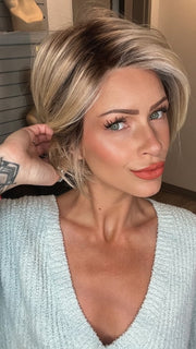 Madeline wearing IGNITE LARGE by JON RENAU in 22F16S8 VENICE BLONDE | Light Ash Blonde and Light Natural Blonde Blend, Shaded with Medium Brown