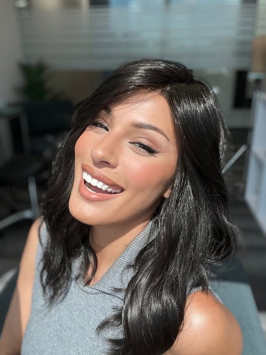 Roxie is wearing HEIDI by JON RENAU in color 4 BROWNIE FINALE | Dark Brown