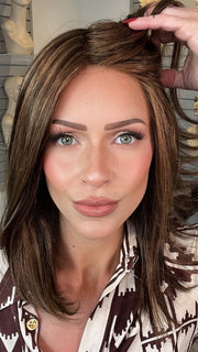 Madeline wearing SOPHISTICATE by TRESSALLURE in SSB6/31/830 |Medium Dark Brown Light Auburn Blend Medium Brown Medium Auburn Highlights.