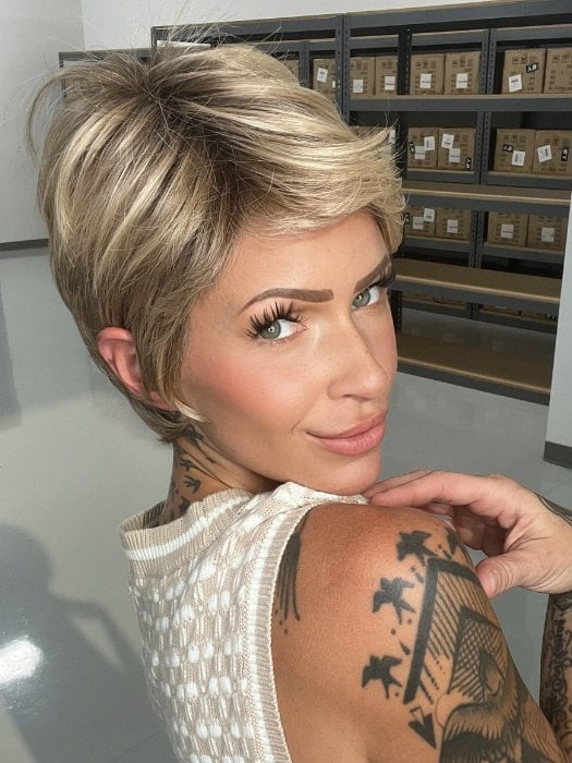Madeline wearing PALO ALTO by BELLETRESS in RAW SUGAR BLONDE | A Neutral Light Blonde, Honey Blonde, Pale Gold Blonde, with a base of Light Brown Low Lights featuring a Medium Root Color