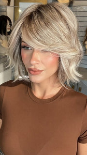 Madeline wearing AUSTEN by BELLETRESS in BUTTERBEER R | Dark Brown Base and Root that transitions smoothly into a buttery blonde, infused with creamy honey and toffee tones