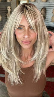 Madeline wearing CAVALLI by BELLETRESS in BUTTERBEER R | Dark Brown Base and Root that transitions smoothly into a buttery blonde, infused with creamy honey and toffee tones