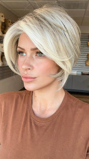 Madeline is wearing IGNITE by JON RENAU in 101/88/27S8 CATALINA BLONDE | Pale blonde with Pure White Natural Violet halo highlights, shaded medium brown