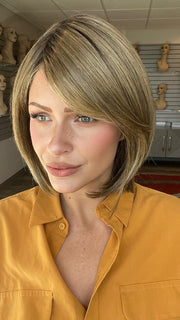 Madeline is wearign ALL THE RAGE by GABOR in GF12-22SS SHADED CAPPUCCINO | Light Golden Brown Evenly Blended with Cool Platinum Blonde Highlights with Dark Roots