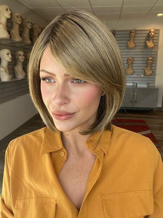 Madeline is wearign ALL THE RAGE by GABOR in GF12-22SS SHADED CAPPUCCINO | Light Golden Brown Evenly Blended with Cool Platinum Blonde Highlights with Dark Roots