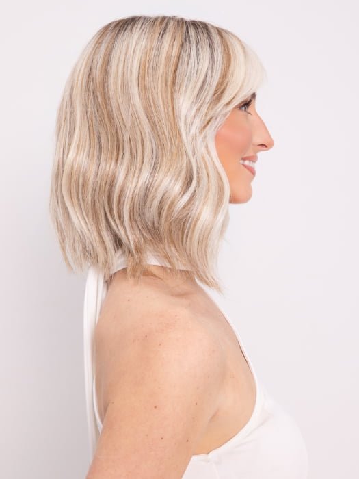 Ava wearing HOLLIE PETITE by JON RENAU in 101/88/27S8 CATALINA BLONDE | Pale blonde with Pure White Natural Violet halo highlights, shaded medium brown
