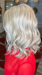Madeline wearing BELLA VIDA BY RAQUEL WELCH in RL19/23 BISCUIT | Light Ash Blonde Evenly Blended with Cool Platinum Blonde