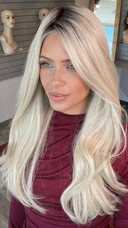 Madeline wearing STAY THE NIGHT by RAQUEL WELCH in RL16/22SS SHADED ICED SWEET CREAM | Pale Blonde with Slight Platinum Highlighting with Dark Roots