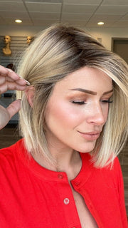 Madeline is wearing SANTA MONICA by BELLETRESS in RAW SUGAR BLONDE | A Neutral Light Blonde, Honey Blonde, Pale Gold Blonde, with a base of Light Brown Low Lights featuring a Medium Root Color