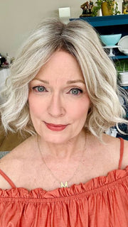 Mel B. @mels.be.ageless wearing JANUARY by JON RENAU in color FS17/101S18 PALM SPRINGS BLONDE | Light Ash Blonde with Pure White Natural Violet Bold Highlights, Shaded with Dark Natural Ash Blonde