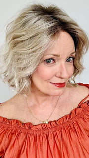 Mel B. @mels.be.ageless wearing JANUARY by JON RENAU in color FS17/101S18 PALM SPRINGS BLONDE | Light Ash Blonde with Pure White Natural Violet Bold Highlights, Shaded with Dark Natural Ash Blonde