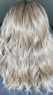 Sandy @i_be_wiggin wearing WAVY DAY by RAQUEL WELCH WIGS in color RL9/24SS ICED CAFÉ LATTE | Dark Brown shaded with Golden Brown